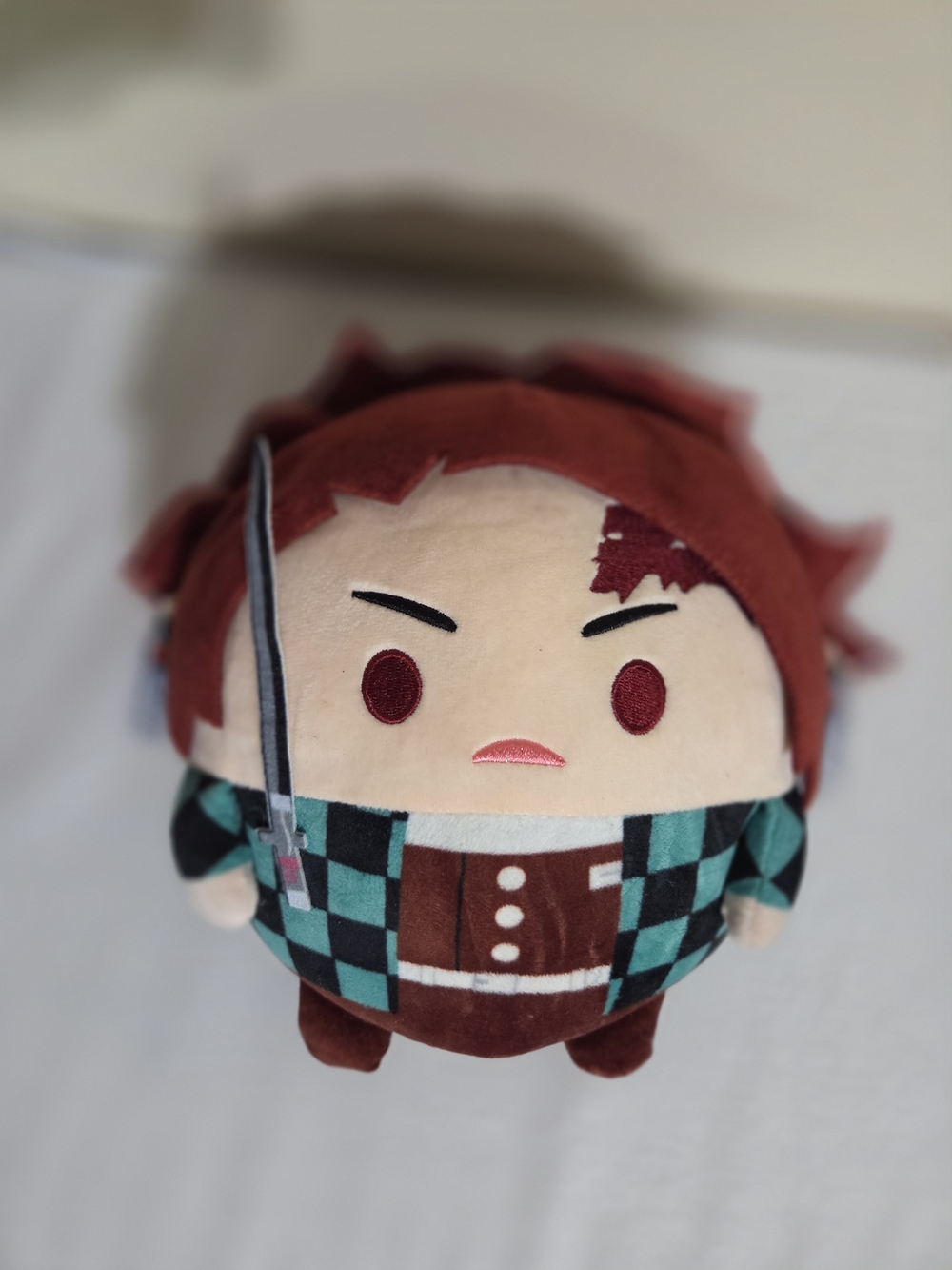 Red-Haired Character Plush Toy in Green Checkered Outfit